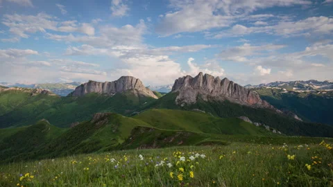 The formation and movement of clouds over the summer slopes of Mountains Stock Footage 149353659