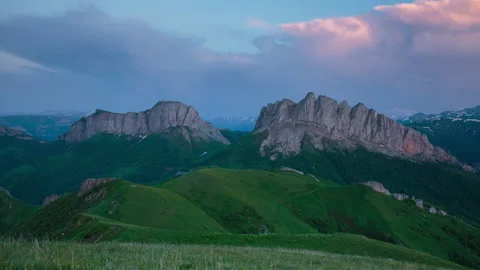 The formation and movement of clouds over the summer slopes of Mountains Stock Footage 149353754