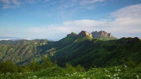 The formation and movement of clouds over the summer slopes of Mountains Stock Footage 149432112