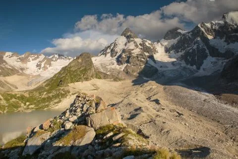 Formation and movement of clouds over mountains peaks Stock Photos