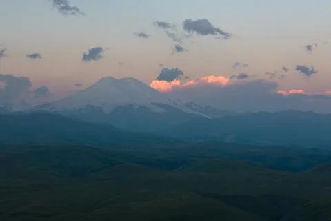 Formation and movement of clouds over mountains peaks Stock Photos