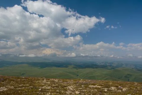 Formation and movement of clouds over mountains peaks Stock Photos