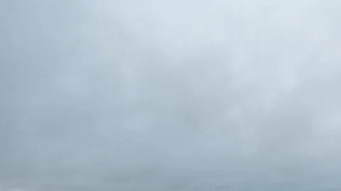 Formation and movement of white clouds of different shapes in the blue sky Stock Footage 94897370