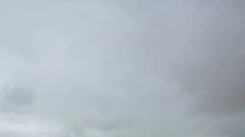 Formation and movement of white clouds of different shapes in the blue sky Stock Footage 94897377