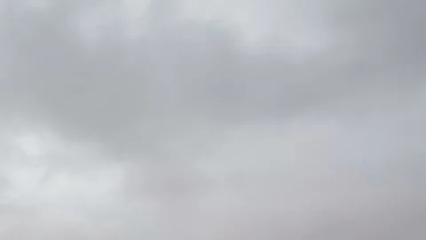 Formation and movement of white clouds of different shapes in the blue sky Stock Footage 94897388