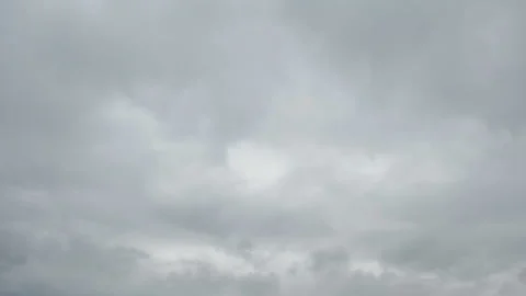 Formation and movement of white clouds of different shapes in the blue sky Stock Footage 94897395