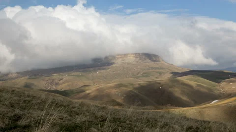 The formation and movements of clouds of the mountains of Caucasus peaks. 動画素材 65212554