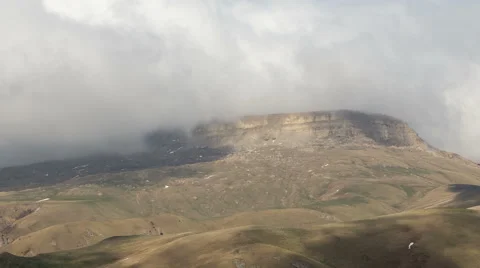 The formation and movements of clouds of the mountains of Caucasus peaks. Stock-Footage 65212609