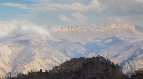 The formation and movements of clouds of the mountains of Caucasus peaks. 動画素材 65217203