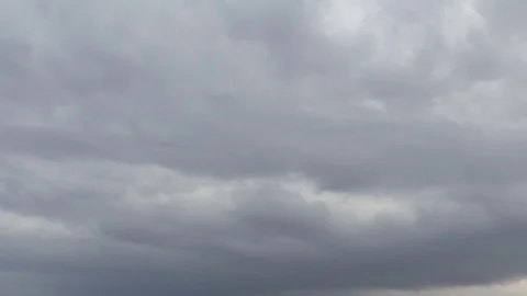 Formation and rapid movement of white clouds of different shapes Stock Footage 74745155