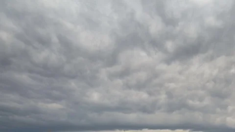 Formation and rapid movement of white clouds of different shapes Stock Footage 74745521