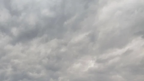 Formation and rapid movement of white clouds of different shapes Stock Footage 74745604