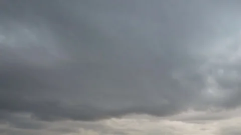 Formation and rapid movement of white clouds of different shapes Stock Footage 74745736