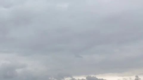 Formation and rapid movement of white clouds of different shapes Stock Footage 74747344