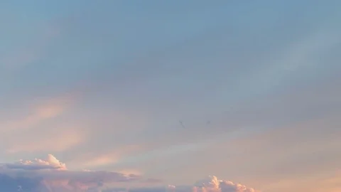Formation and rapid movement of white clouds of different shapes in the blue sky Stock Footage 77733843