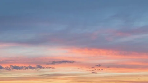 Formation and rapid movement of white clouds of different shapes in the blue sky Stock Footage 77733904
