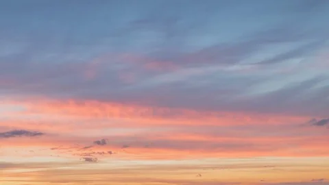 Formation and rapid movement of white clouds of different shapes in the blue sky Stock Footage 77733927
