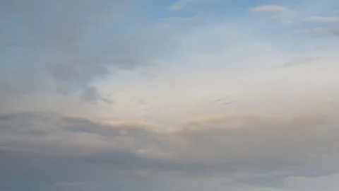 Formation and rapid movement of white clouds of different shapes Stock Footage 83662767