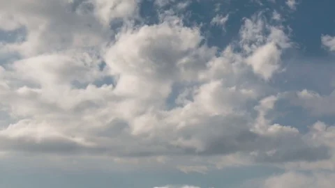 Formation and rapid movement of white clouds of different shapes Stock Footage 83663171