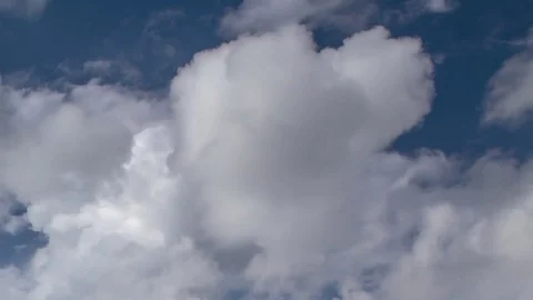 Formation and rapid movement of white clouds of different shapes Stock Footage 83663482