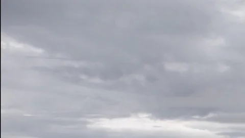 Formation and rapid movement of white clouds of different shapes Stock Footage 83663790