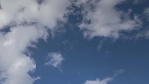 Formation and rapid movement of white clouds of different shapes Stock Footage 83673858