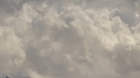 Formation and rapid movement of white clouds of different shapes Stock Footage 83673861