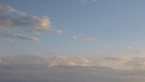 Formation and rapid movement of white clouds of different shapes Stock Footage 83673964