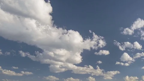 Formation and rapid movement of white clouds of different shapes Stock Footage 83674022