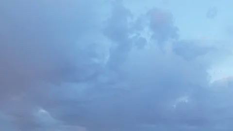 Formation and rapid movement of white clouds of different shapes Stock Footage 85463492