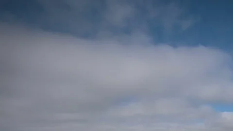 Formation and rapid movement of white clouds of different shapes Stock Footage 85463586