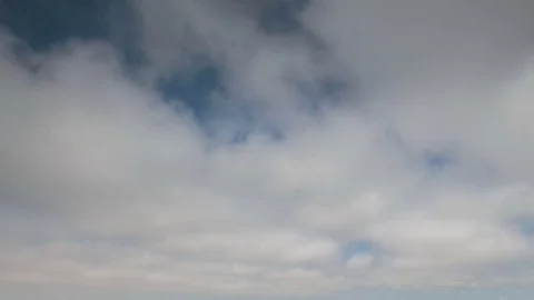 Formation and rapid movement of white clouds of different shapes Stock Footage 85463607