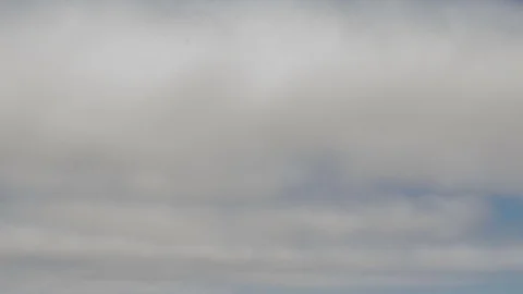 Formation and rapid movement of white clouds of different shapes Stock Footage 85463624