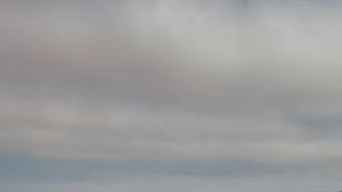 Formation and rapid movement of white clouds of different shapes Stock Footage 85463639