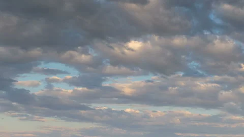 Formation and rapid movement of white clouds in the blue sky in spring Stock Footage 90398499