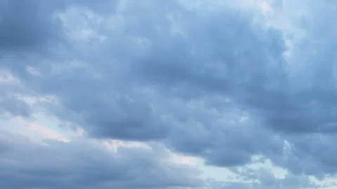 Formation and rapid movement of white clouds in the blue sky in spring Stock Footage 90398591