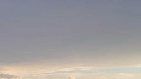 Formation and rapid movement of white clouds of different shapes in the blue sky Stock Footage 103377931