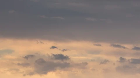 Formation and rapid movement of white clouds of different shapes in the blue sky Stock Footage 103378010
