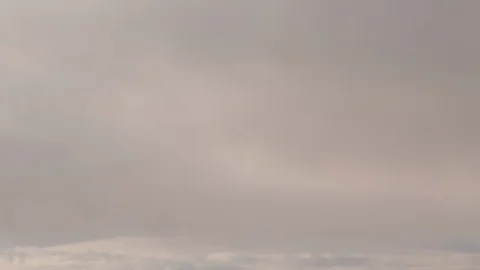 Formation and rapid movement of white clouds of different shapes in the blue sky Stock Footage 103378214