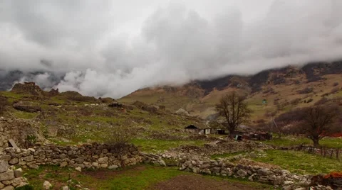 The formation of clouds in the ancient settlement - Dagom. Stock Footage 50368499