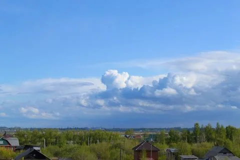 Formation of clouds and rain clouds in the blue sky Stock Photos