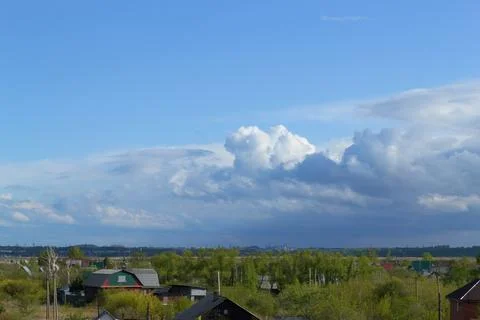 Formation of clouds and rain clouds in the blue sky Stock Photos