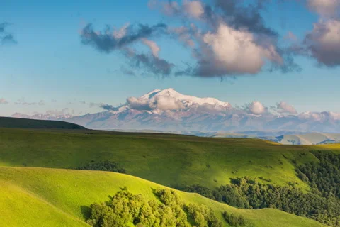 The formation of clouds over the mountains. Mountain Elbrus. Stock Footage 52690845