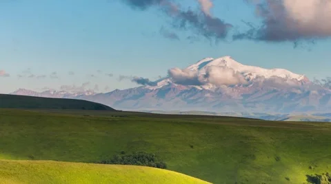 The formation of clouds over the mountains. Mountain Elbrus. Video stock 52690958