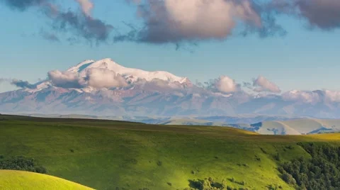 The formation of clouds over the mountains. Mountain Elbrus. Stock Footage 52690999