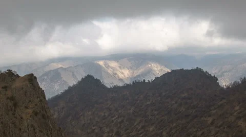 The formation  of clouds up to the slopes of the mountains of Caucasus Stock Footage 66016319