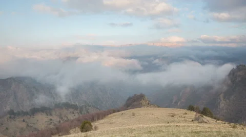 The formation of clouds up to the slopes of the mountains of Caucasus Stock-Footage 66029984