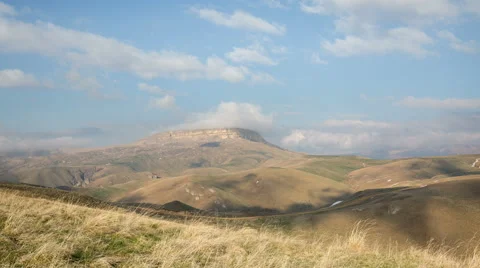 The formation of clouds up to the slopes of the mountains of Caucasus Stock Footage 66730361