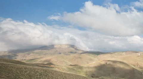 The formation  of clouds up to the slopes of the mountains of Caucasus Stock Footage 66730619