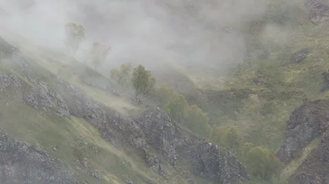 The formation  of clouds up to the slopes of the mountains of Caucasus Video stock 66761622